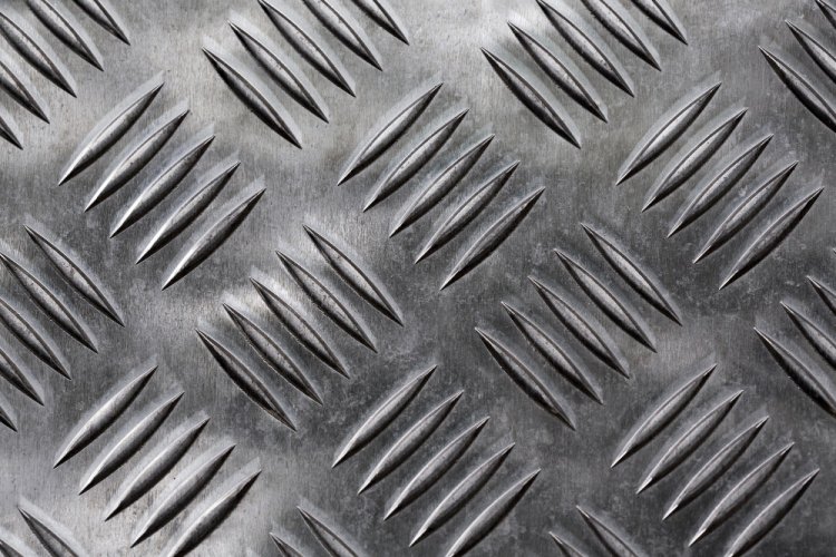 Historical Evolution of Chequered Plates in Engineering and Construction